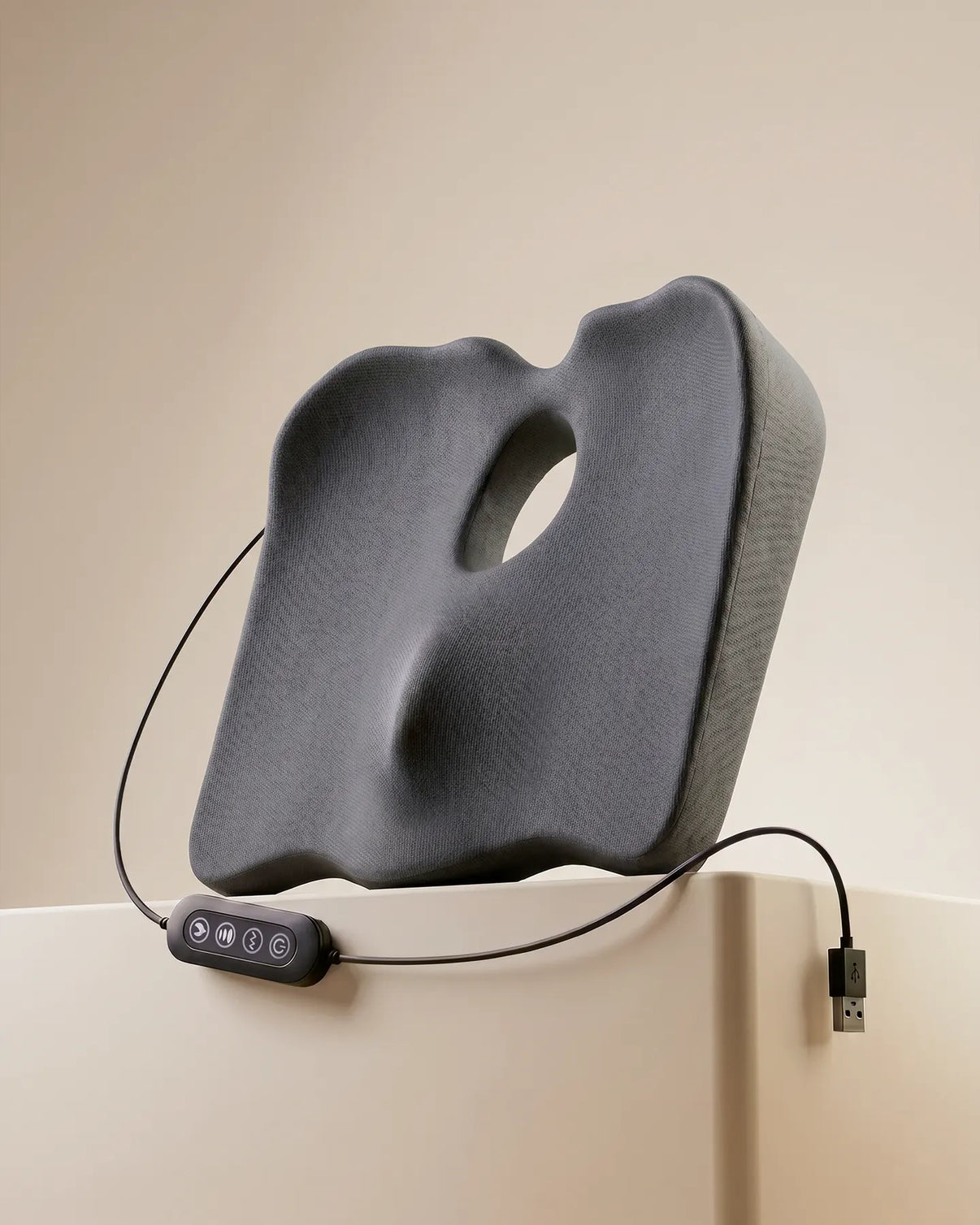 Peyako Smart Cushion Pro in gray with wired massage controller
